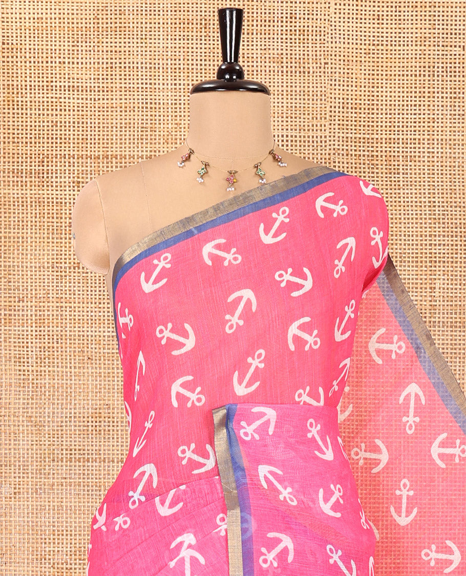 Rani Pink Linen Cotton Saree, Accentuated with Anchor Motifs Printed on Its Body, a Subtle Contrast Piping Border, Multi-Color Striped Pallu, and Paired with a Contrast Blouse