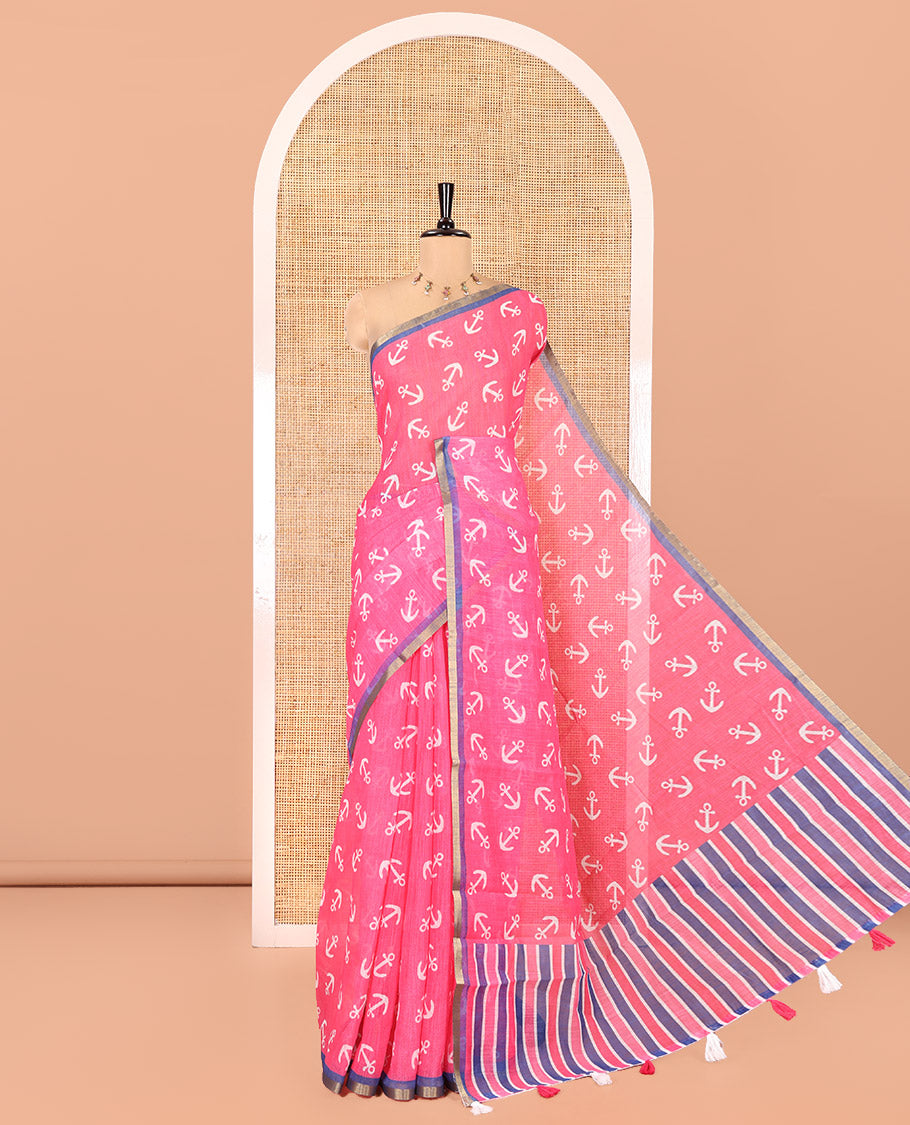 Rani Pink Linen Cotton Saree, Accentuated with Anchor Motifs Printed on Its Body, a Subtle Contrast Piping Border, Multi-Color Striped Pallu, and Paired with a Contrast Blouse