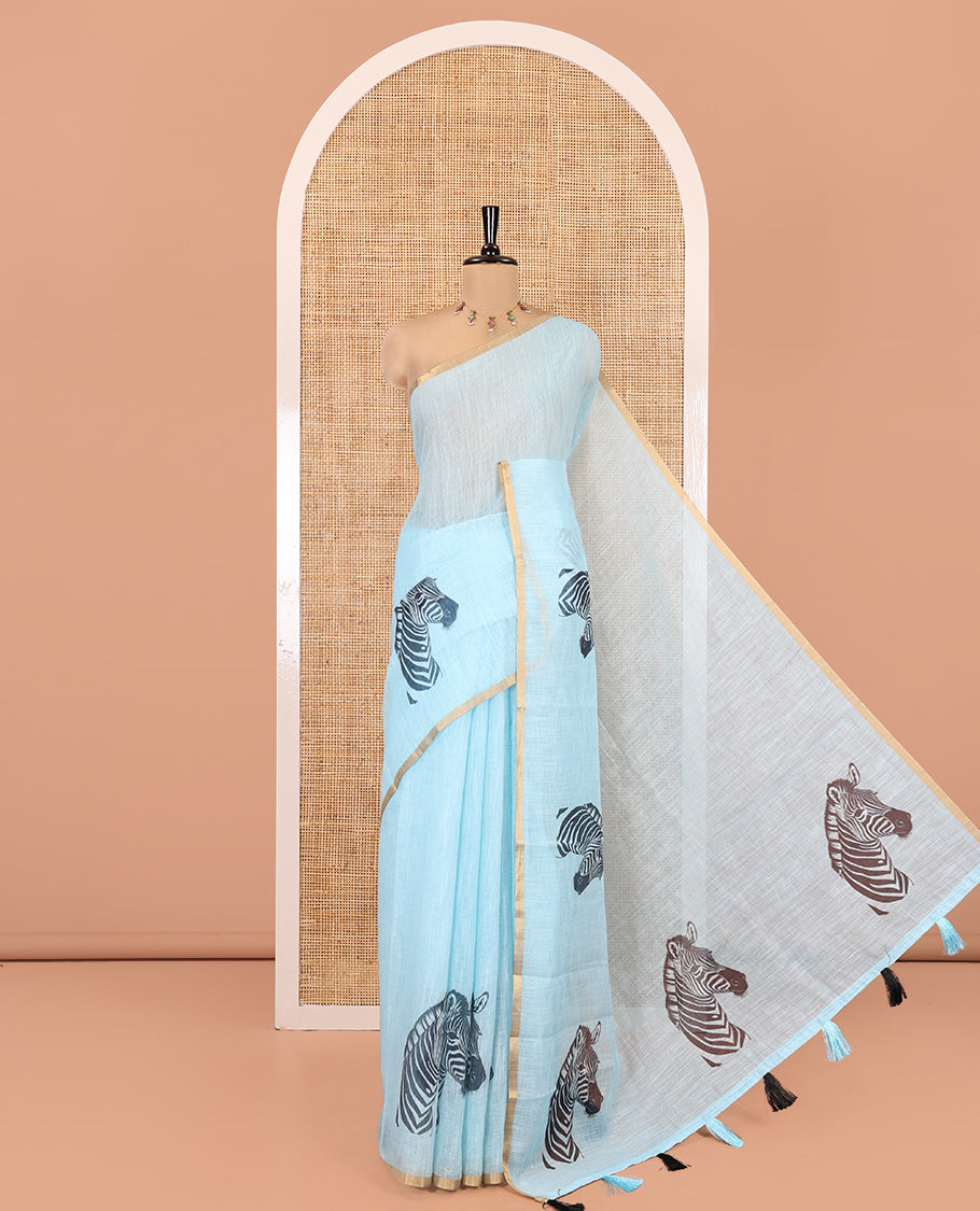 Sky Blue Linen Cotton Saree, Accentuated with Zebra Motifs Print, A Subtle Piping Border, Zebra Printed Pallu, and Comes with a Contrast Blouse