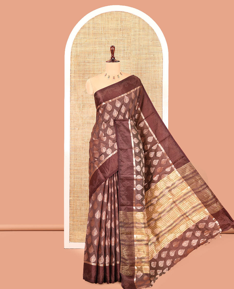 Brown Semi-Tussar Saree, Delicately Woven with Zari Buttas, a Satin Embossed Border, Gleaming Pallu, and a Matching Blouse