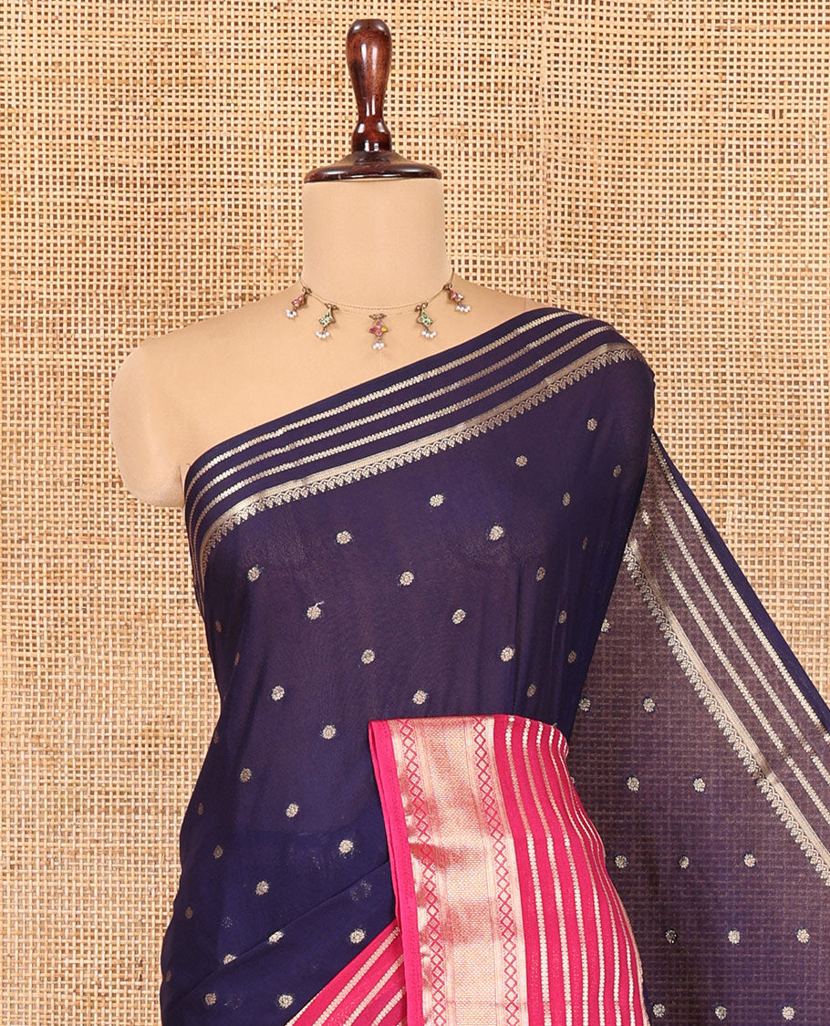 Navy Blue Art Crepe Saree Features Zari Buttas, Complemented by Contrast Traditional Zari Border, Zari Striped Pallu, and a Contrast Blouse