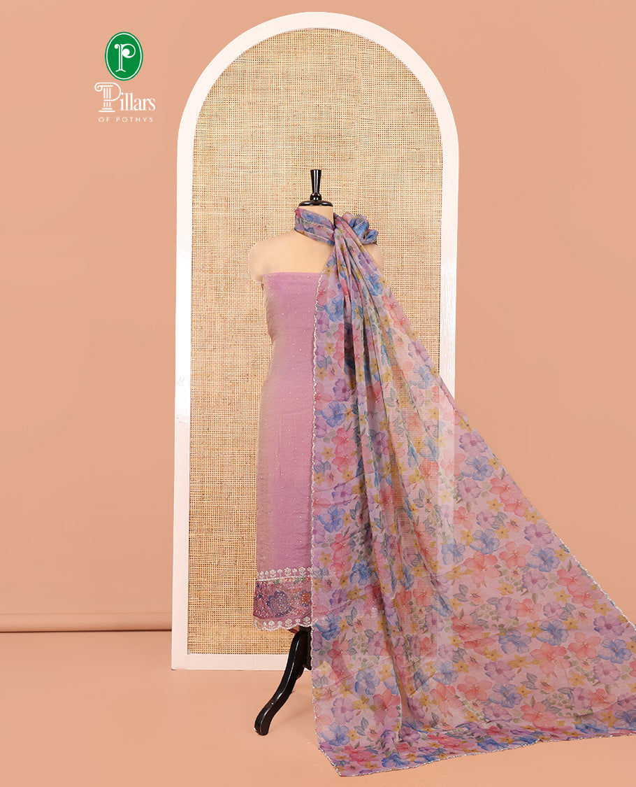 Lavender Moss Organza Material Chudidar Set, Gleamed Up with Stonework Top, a Plain Santoon Bottom, and Paired with Floral Print and Scallop Stonework Dupatta