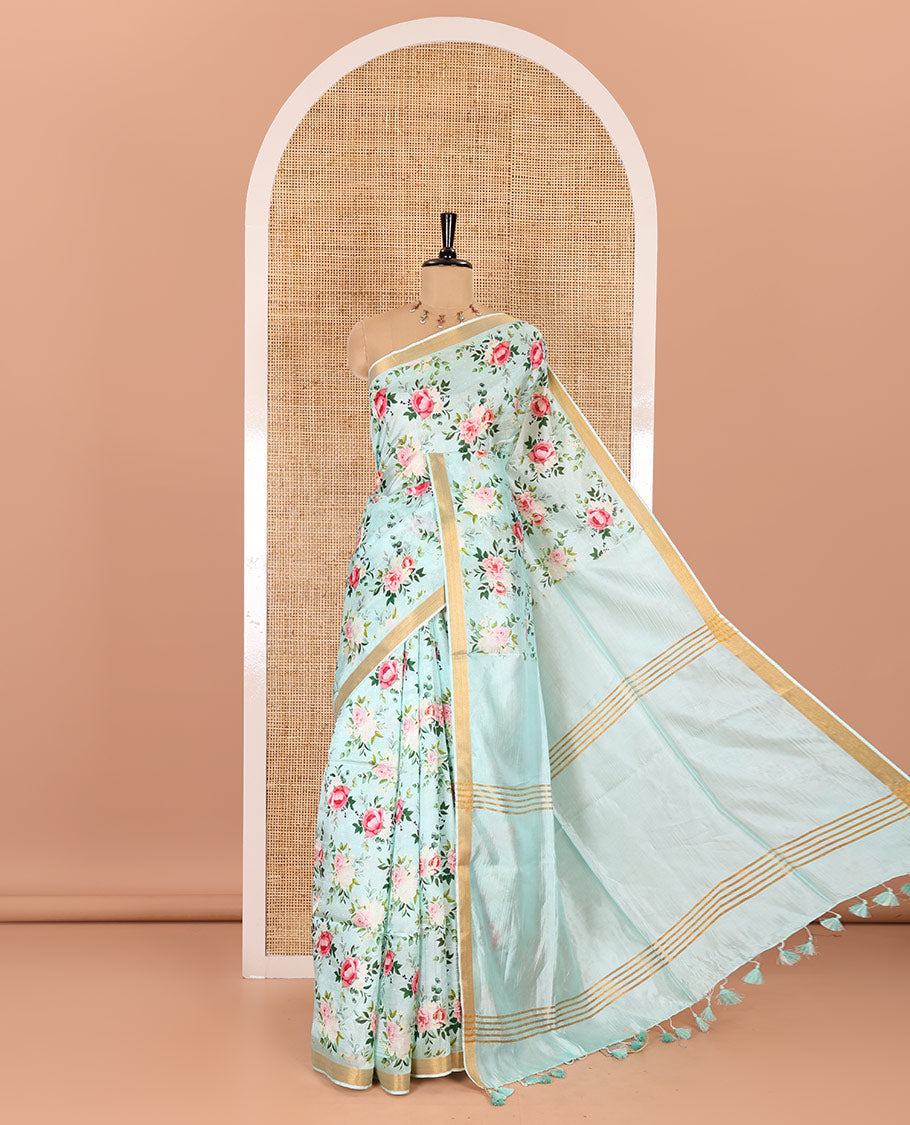 Mint green colorful rose floral motifs digital printed banana pith saree, piping border, striped pallu, and floral printed blouse