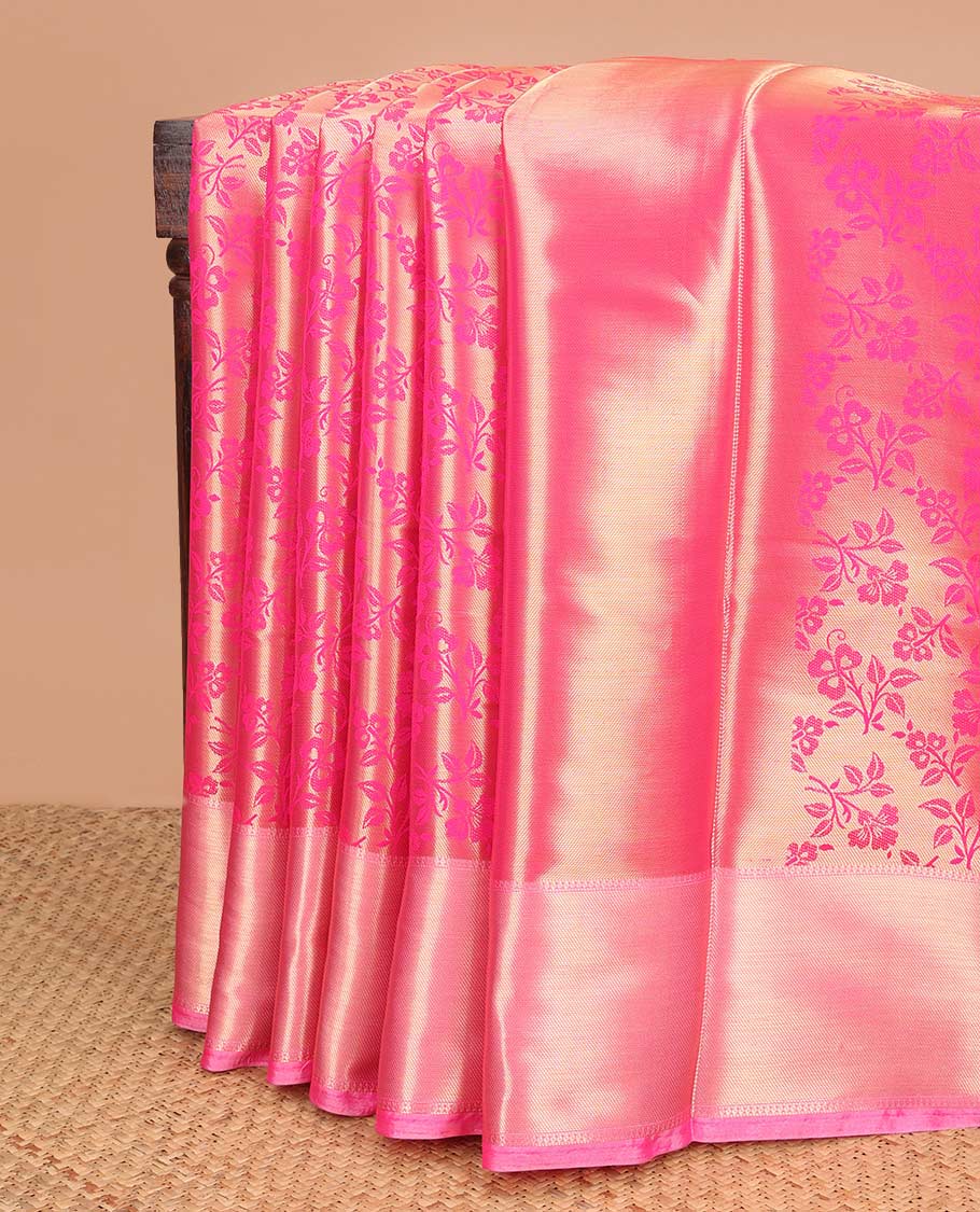 Rani pink floral design tissue saree with zari border & rich pallu along with contrast blouse