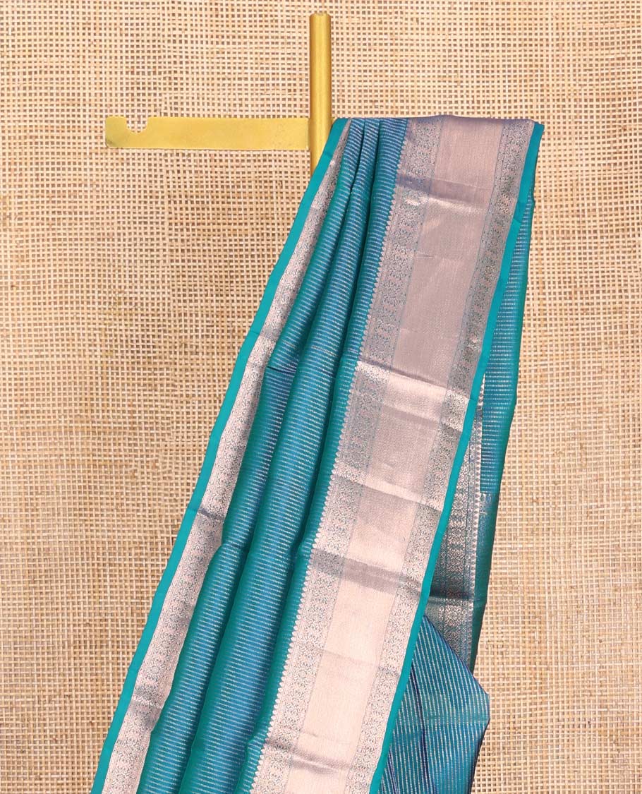 Blue Vasundhara Lite-Silk Mix Saree, Graced with Muthu Stripes, Highlighted by a Zari Border, Grand Pallu of Geometric Patterns, and Paired with a Matching Blouse