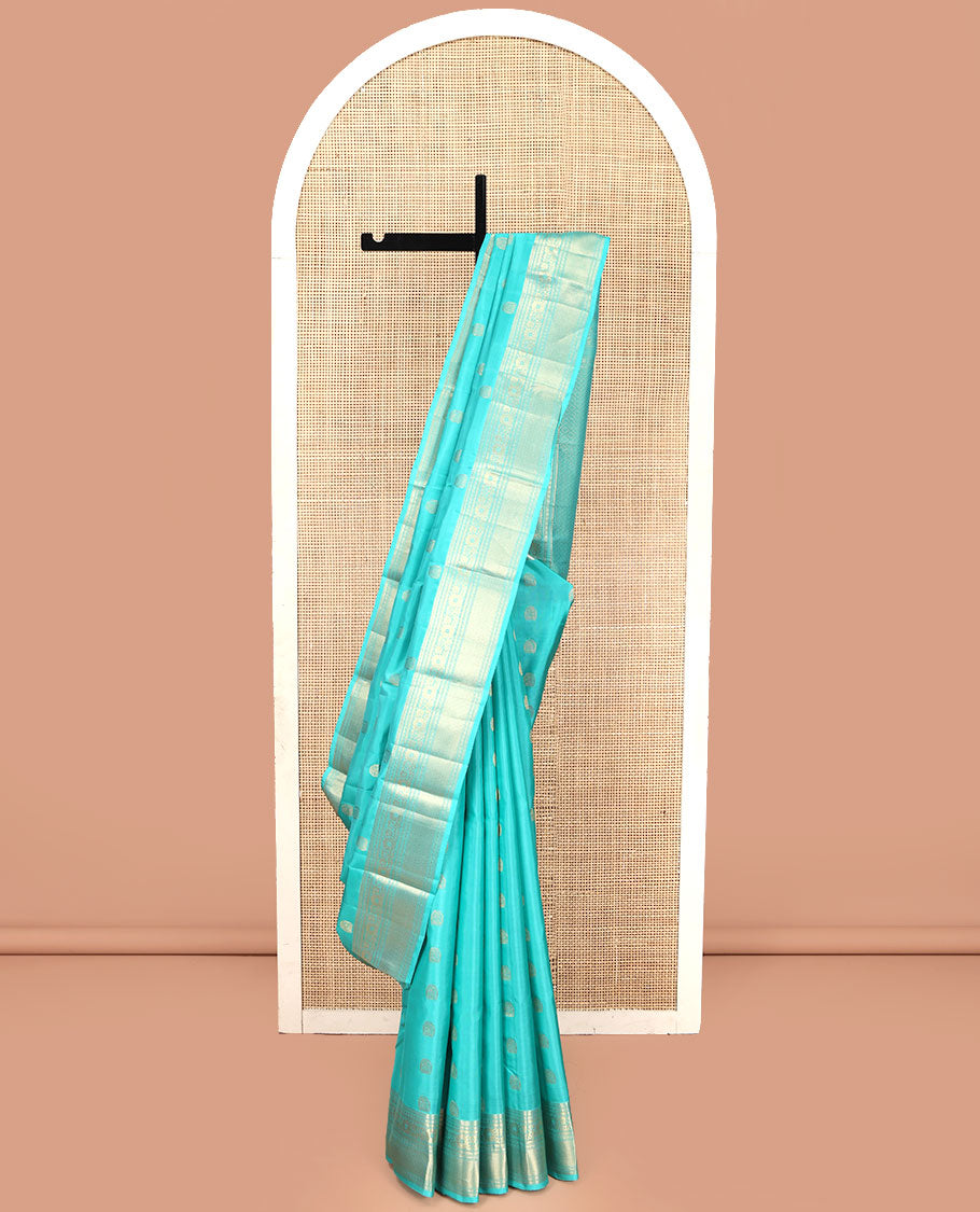 Blue Vasundhara Lite Silk Mix Saree, Sparsely Woven with Zari Buttas, Highlighted by a Zari Border of Rekku, Kamalam, and Mayil Kann Designs, Pallu of Jaal Designs, and Paired with a Matching Blouse