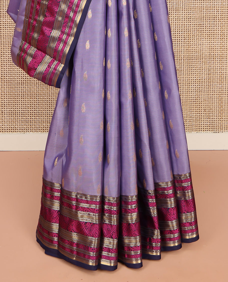 Lavender Vasundhara Lite Silk Mix Saree, Embellished with Zari Buttas on Its Body, Complemented by a Contrast Border of Rekku, Muthu, and Kodi Visiry Designs, Pallu Steeped with Chakram Designs, and Paired with a Contrast Blouse