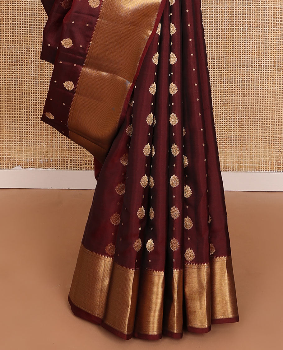 Maroon zari buttas vasundhara elite silksaree, zari border of rekku,neli & zari stripes & jaal pallu