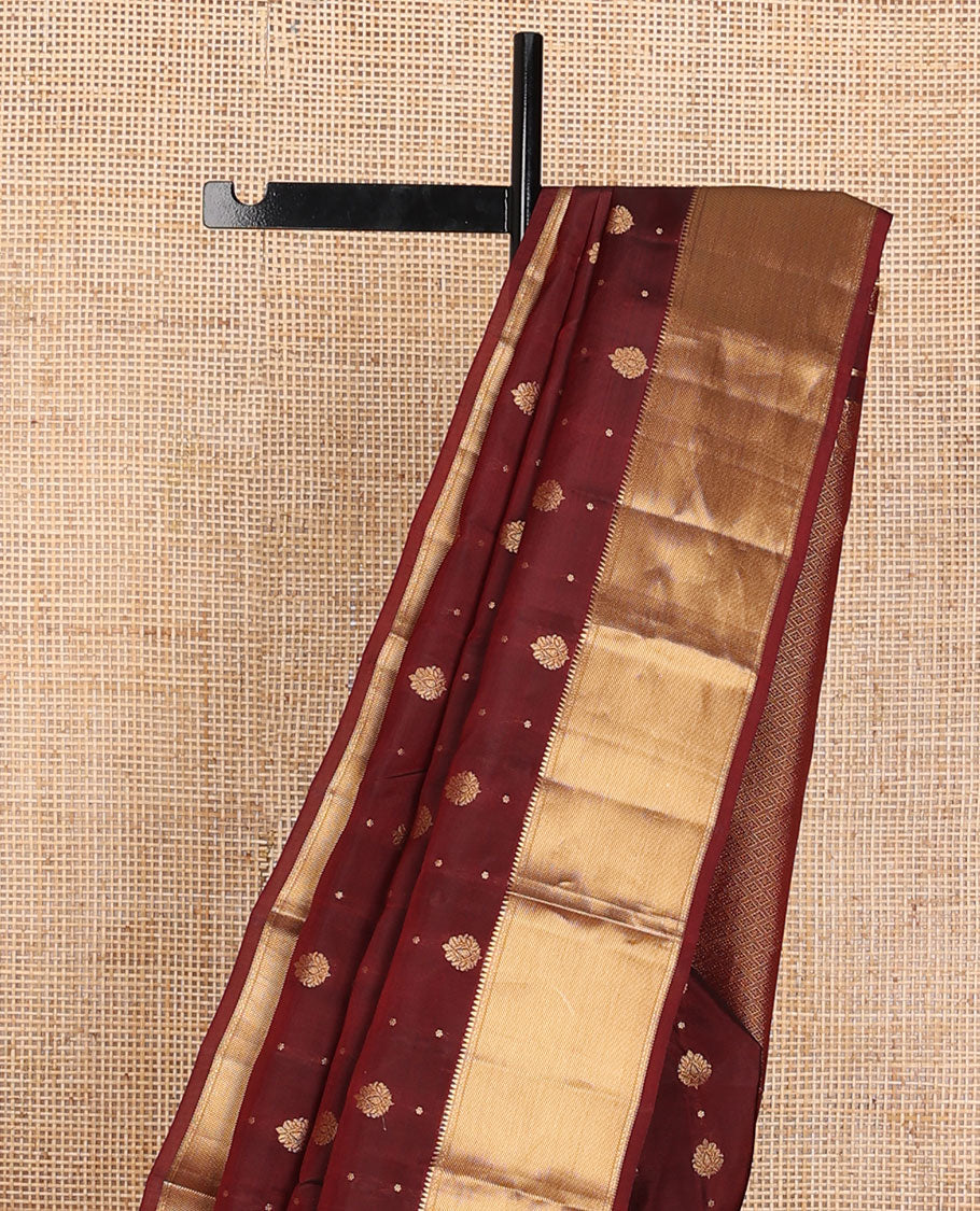 Maroon zari buttas vasundhara elite silksaree, zari border of rekku,neli & zari stripes & jaal pallu