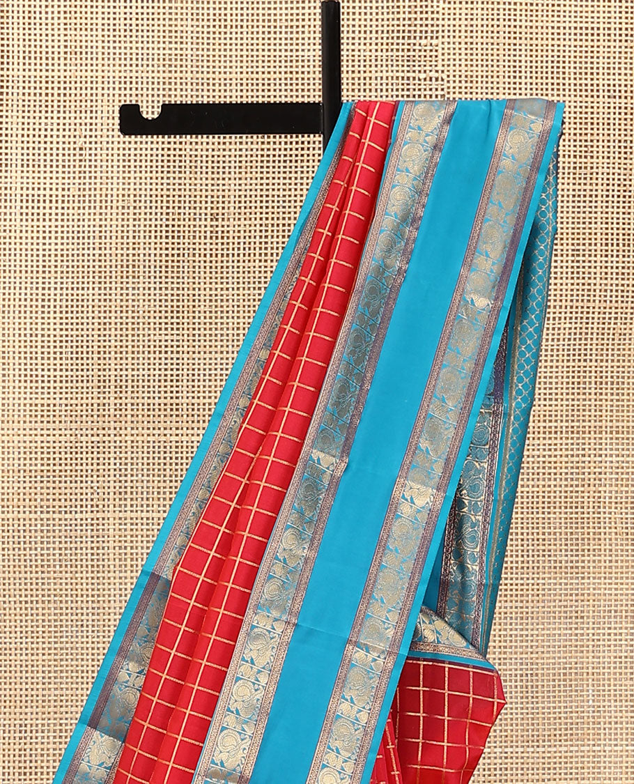 Red Vasundhara Lite Silk Mix Saree, Beautified with Zari Checked Designs on Its Body, Complemented by a Contrast Rettai Pettu Border of Cross Kamalam, Mayil, and Manga Designs, Gleaming Zari Design Pallu, and Paired with a Contrast Blouse
