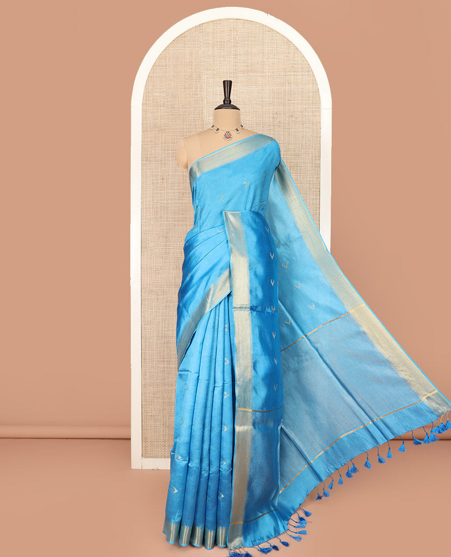 Blue Banana Pith Saree Decorated with Zari Temple Buttas, Delicately Woven Temple Zari Border, Gleaming Zari Pallu of Horizontal Stripes in Zari, and Paired with a Matching Plain Blouse