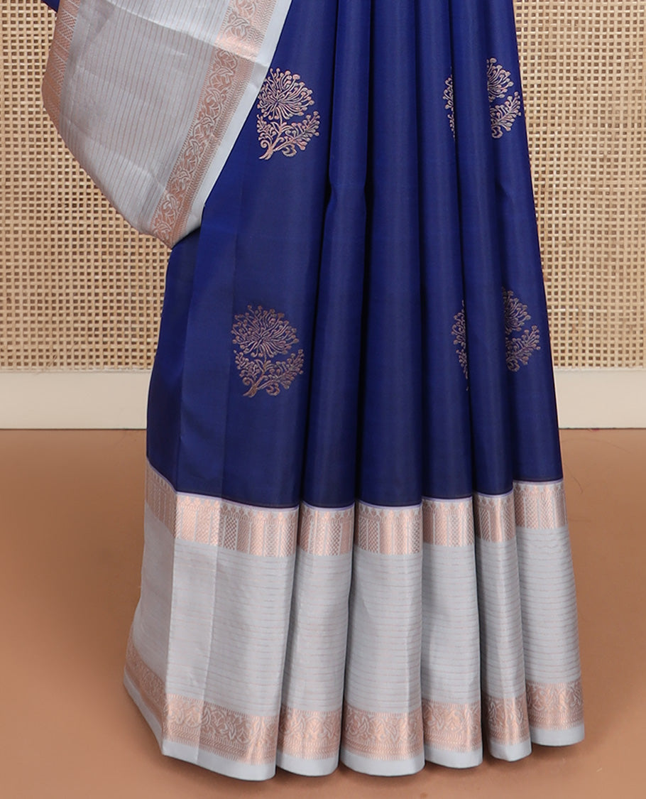 Blue floral zari buttas silk saree, contrast border of thilakam, muthu, ara maadam, kuyil kann, and vanki designs, and jaal pallu
