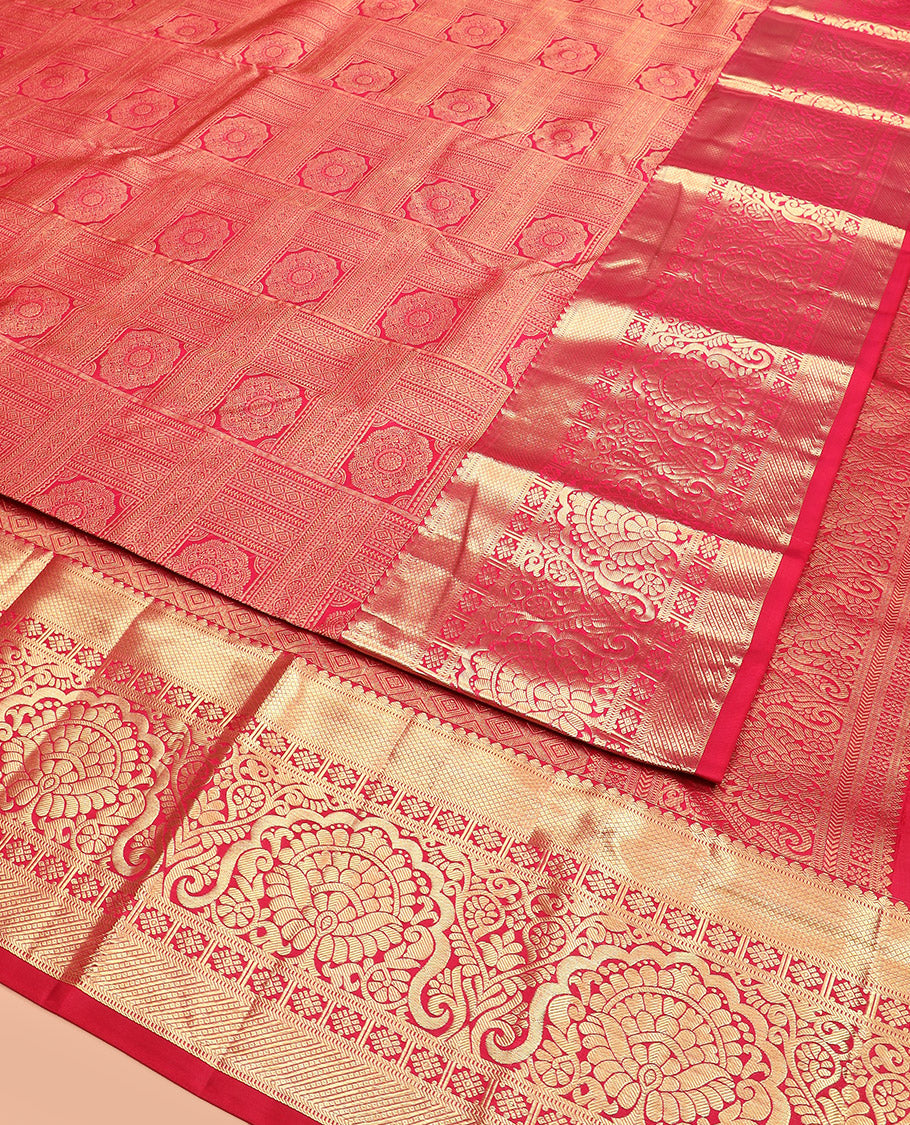 Red Kanchipuram Silk Saree Artfully Detailed with Jacquard Design, Highlighted with Zari Border of Thilakam, Muthu, Mayil Kann, Diamond, and Kamalam Designs, Gracefully Embellished Pallu, and Paired with a Matching Blouse
