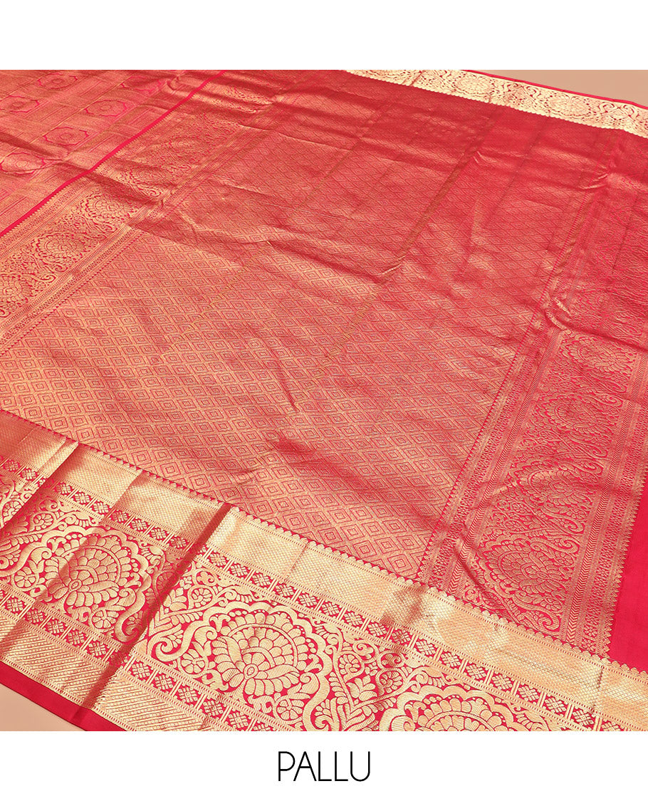 Red Kanchipuram Silk Saree Artfully Detailed with Jacquard Design, Highlighted with Zari Border of Thilakam, Muthu, Mayil Kann, Diamond, and Kamalam Designs, Gracefully Embellished Pallu, and Paired with a Matching Blouse