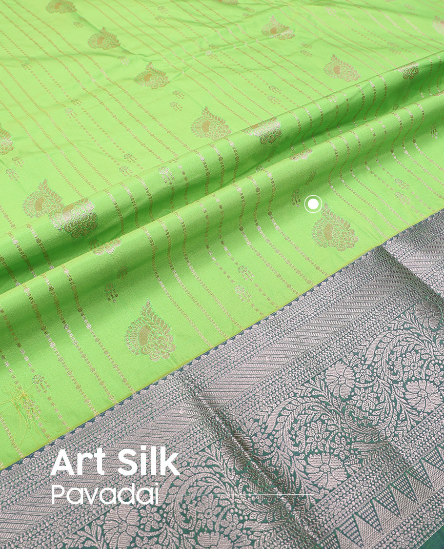 Green art silk pavadai set, zari design with contrast traditional zari bordered skirt and a contrast zari design blouse