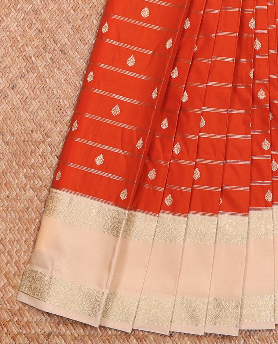 Orange Budget Silk Saree Enthralled with Zari Stripes and Zari Buttas, Highlighted with a Contrast Traditional Zari Border, Subtly Woven Jaal Pallu, and Paired with a Contrast Blouse