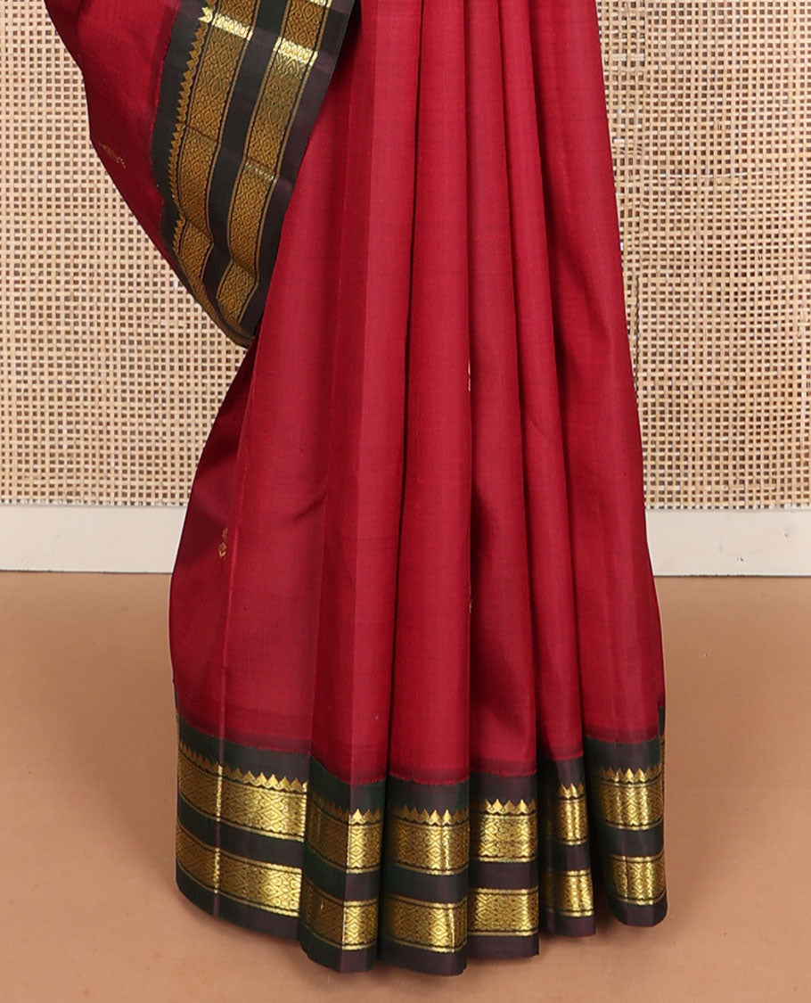 Maroon zari buttas Kanchipuram silksaree, contrast one-sided korvai border of thilakam mokku & jaal design & zari design pallu