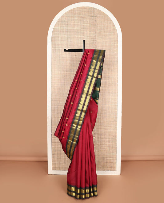 Maroon zari buttas Kanchipuram silksaree, contrast one-sided korvai border of thilakam mokku & jaal design & zari design pallu