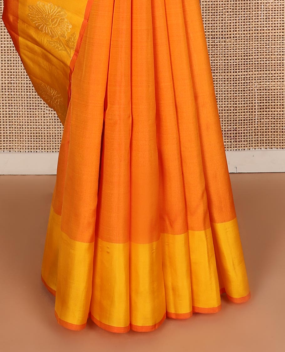 Orange zari buttas Kanchipuram silk saree, contrast floral design border, and pallu of manga designs