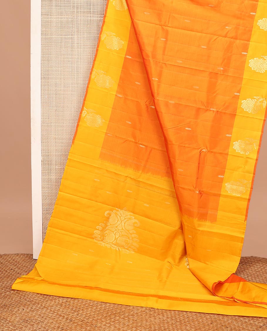 Orange zari buttas Kanchipuram silk saree, contrast floral design border, and pallu of manga designs