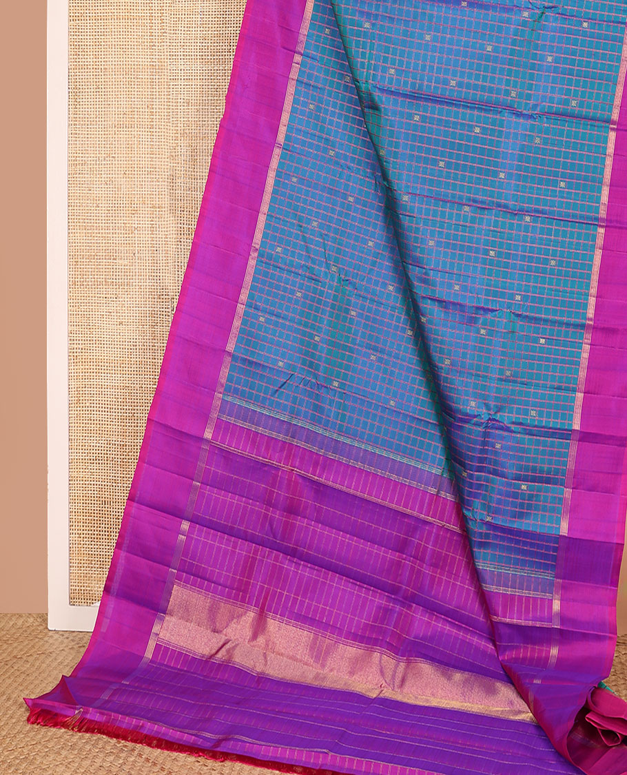 Blue checked and zari buttas Kanchipuram silk saree, contrast kal erangina border, and zari design pallu
