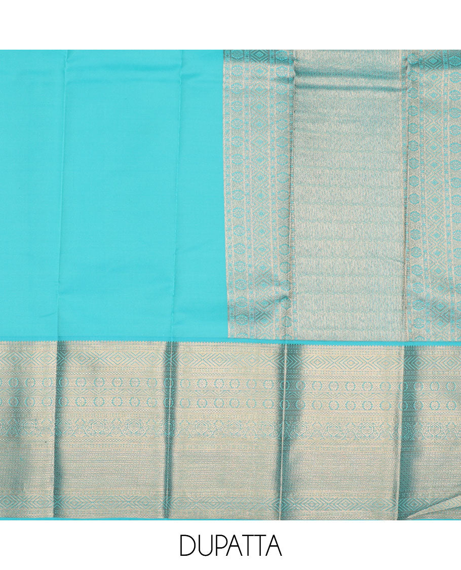Green pure-silk half-saree, jacquard skirt, contrast blouse, and border of thilakam, banaras, poun, diamond, cross kamalam, and then kuli kann designs, and intricate dhavani