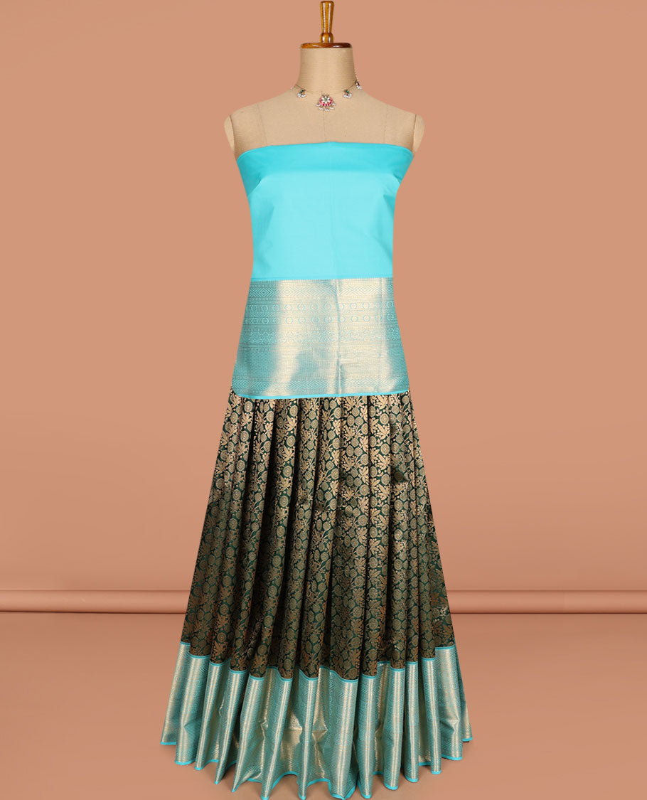 Green pure-silk half-saree, jacquard skirt, contrast blouse, and border of thilakam, banaras, poun, diamond, cross kamalam, and then kuli kann designs, and intricate dhavani