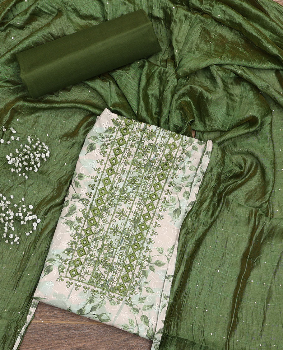 White and green material chudidar set, floral print, cut work and embroidered top, contrast plain bottom, and sequins striped dupatta