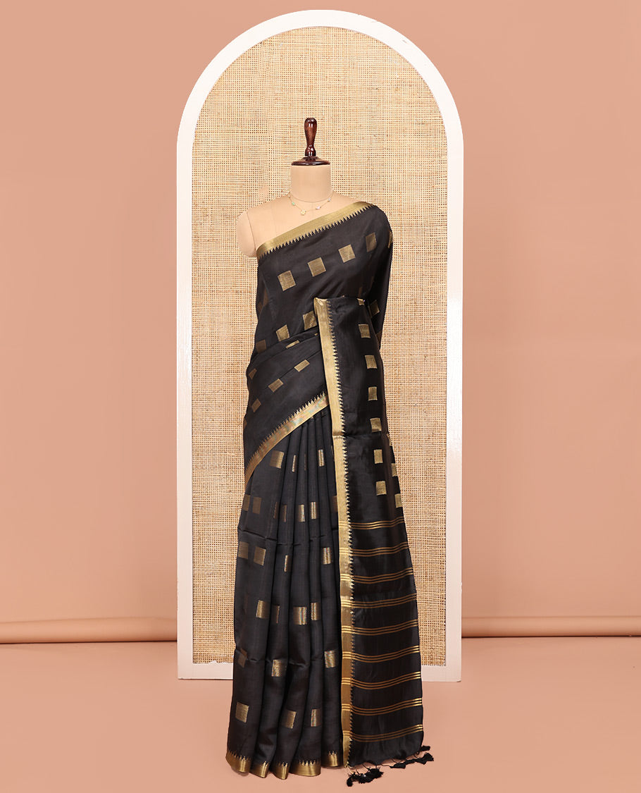 Black Banana Pith Saree, Beautified with Square Buttas All Over Its Body, Subtle Zari Temple Border, Pallu Steeped with Stripes, and Paired with a Matching Blouse