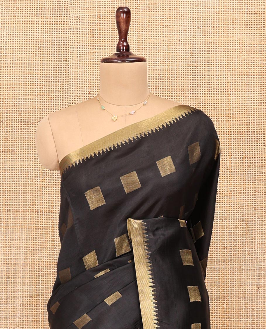 Black Banana Pith Saree, Beautified with Square Buttas All Over Its Body, Subtle Zari Temple Border, Pallu Steeped with Stripes, and Paired with a Matching Blouse