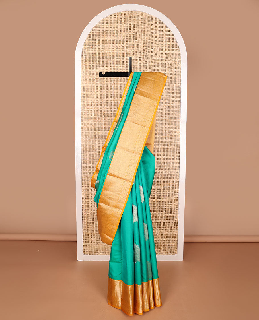 Green buttas silk saree with contrast border thilakm mokku, banaras, muthu design & floral design pallu