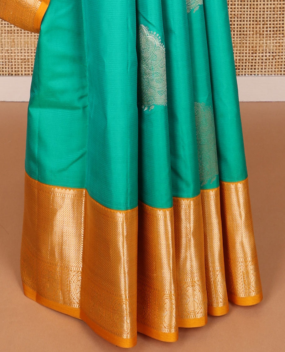 Green buttas silk saree with contrast border thilakm mokku, banaras, muthu design & floral design pallu