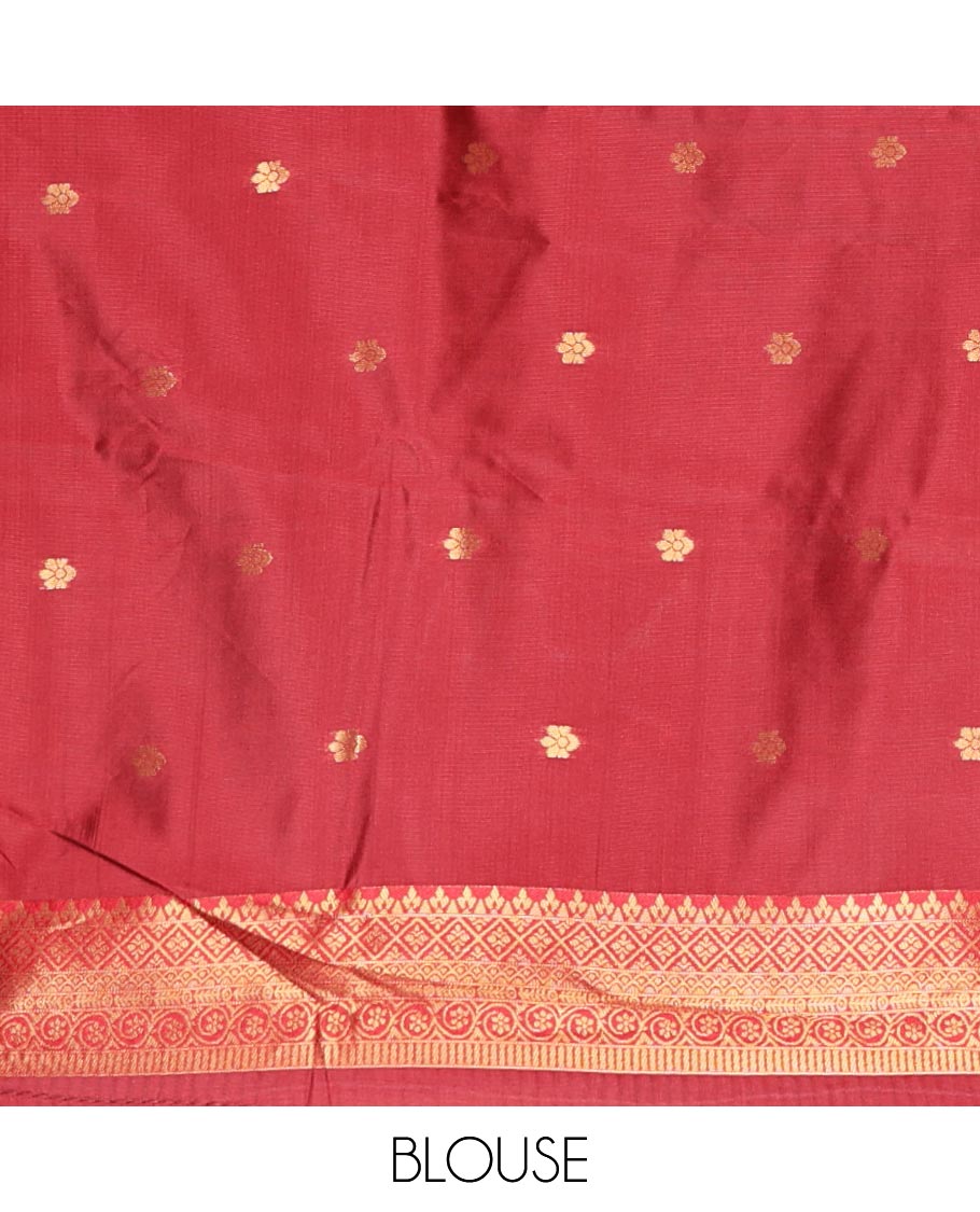 Rust Orange Kanchi Silk Saree Graced with Gold Zari Buttas Woven All Over Its Body, Complemented by Contrast Traditional Zari Design Border, Pallu Majestically Detailed with Intricate Zari Designs, and Paired with a Contrast Blouse