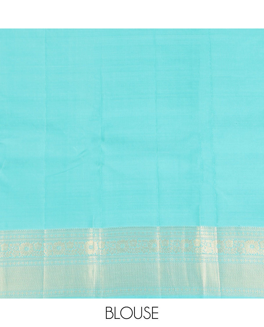 Blue Vasundhara Lite Silk Mix Saree, Sparsely Woven with Zari Buttas, Highlighted by a Zari Border of Rekku, Kamalam, and Mayil Kann Designs, Pallu of Jaal Designs, and Paired with a Matching Blouse