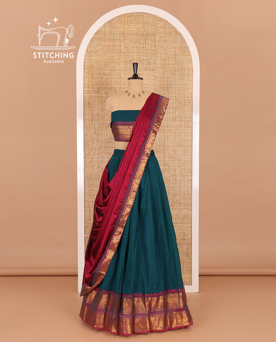Peacock-rani pink sungudi cotton half-saree, plain with contrast traditional zari varisai pettu bordered skirt, a matching blouse, and a zari bordered dhavani