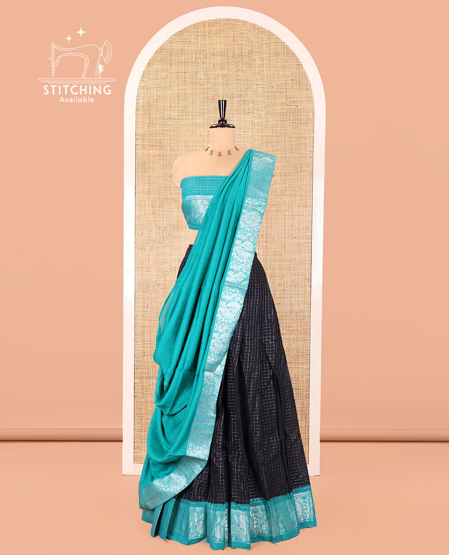 Black and Green Sungudi Cotton Half-Saree, Beautified with Micro-Zari Checks on Its Skirt, Complemented by a Contrast Peacock Zari Border, Paired with a Contrast Blouse, and a Contrast Syska Georgette Zari-Bordered Dhavani