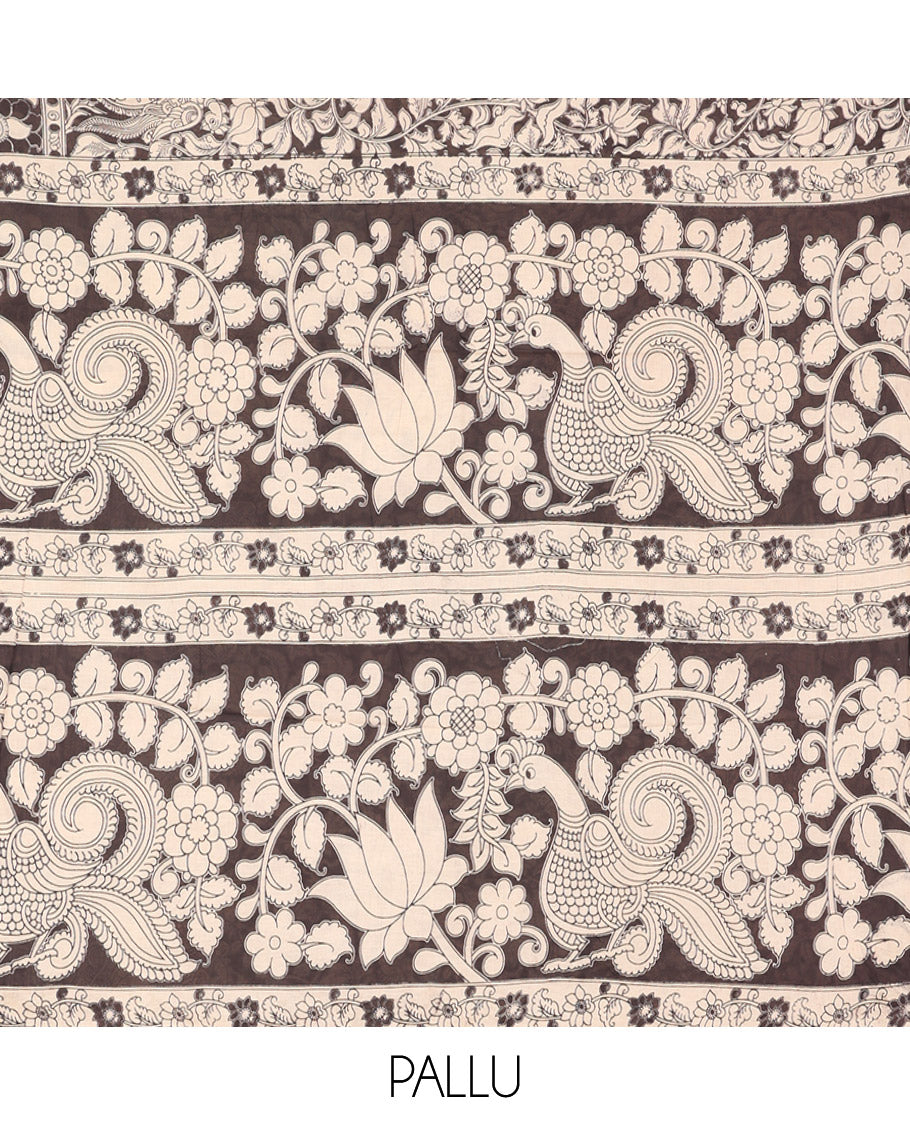 Black Kalamkari Cotton Saree, Impeccably Styled with Floral Vine Print, Floral Printed Border, Pallu of Peacock Motifs, and a Matching Blouse