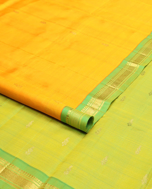 Yellow zari buttas kanchipuram silksaree, contrast one-sided border of paneer sombu,banaras & mayil kann design & zari design pallu