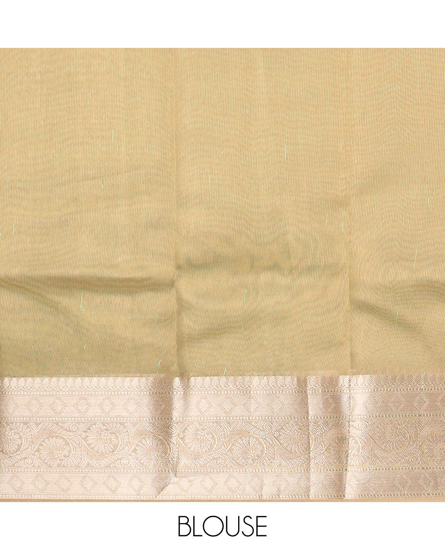 Green tissue saree with self zari design border & intricate zari design pallu