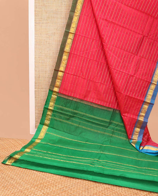Red striped kancheepuram silk saree with contrast ganga jamuna border of thilakam mokku, banaras, paun & zari design pallu