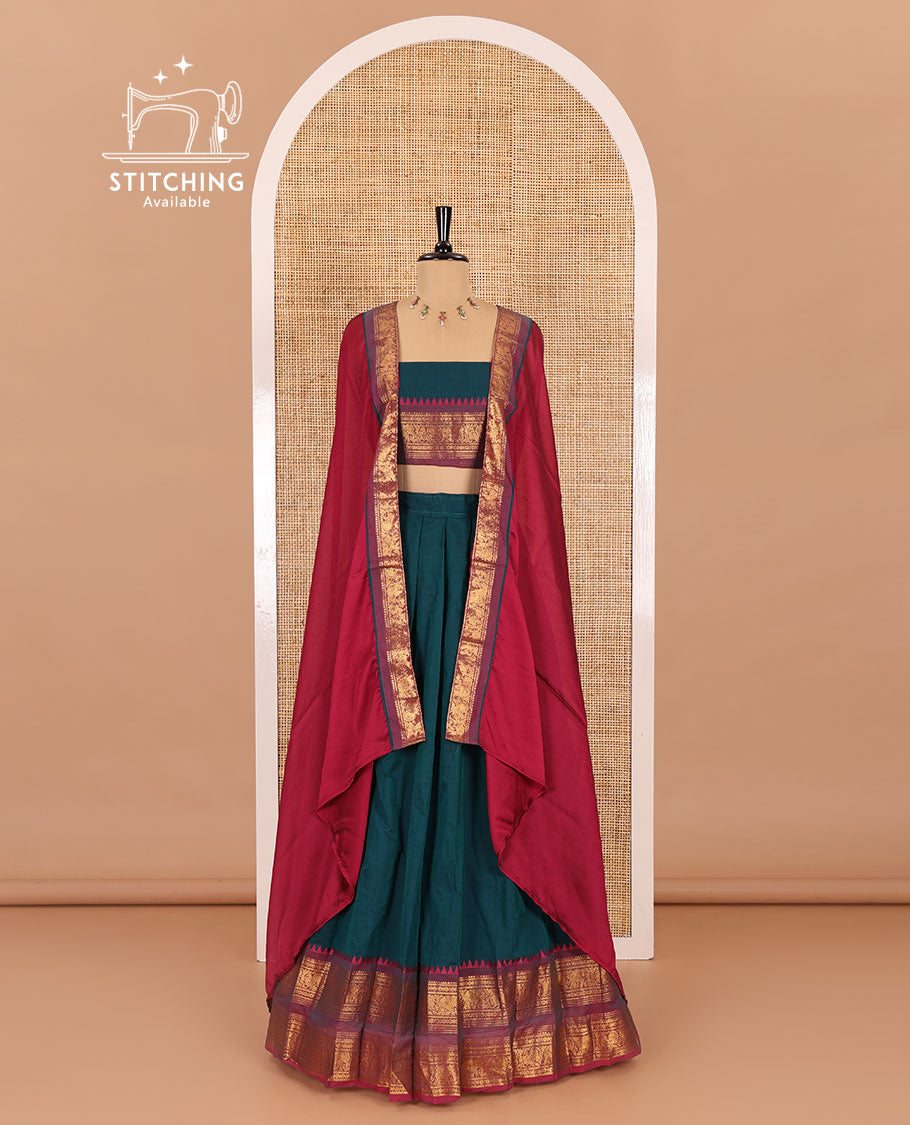 Peacock-rani pink sungudi cotton half-saree, plain with contrast traditional zari varisai pettu bordered skirt, a matching blouse, and a zari bordered dhavani