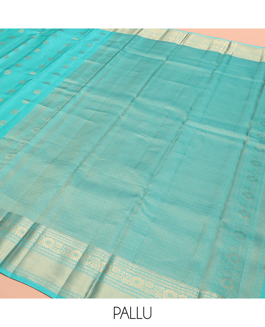 Blue Vasundhara Lite Silk Mix Saree, Sparsely Woven with Zari Buttas, Highlighted by a Zari Border of Rekku, Kamalam, and Mayil Kann Designs, Pallu of Jaal Designs, and Paired with a Matching Blouse