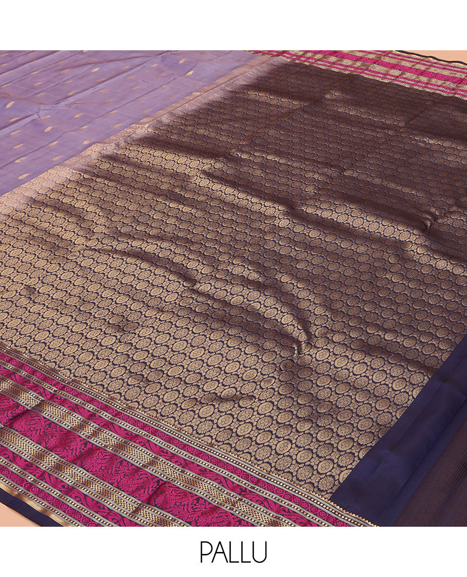 Lavender Vasundhara Lite Silk Mix Saree, Embellished with Zari Buttas on Its Body, Complemented by a Contrast Border of Rekku, Muthu, and Kodi Visiry Designs, Pallu Steeped with Chakram Designs, and Paired with a Contrast Blouse