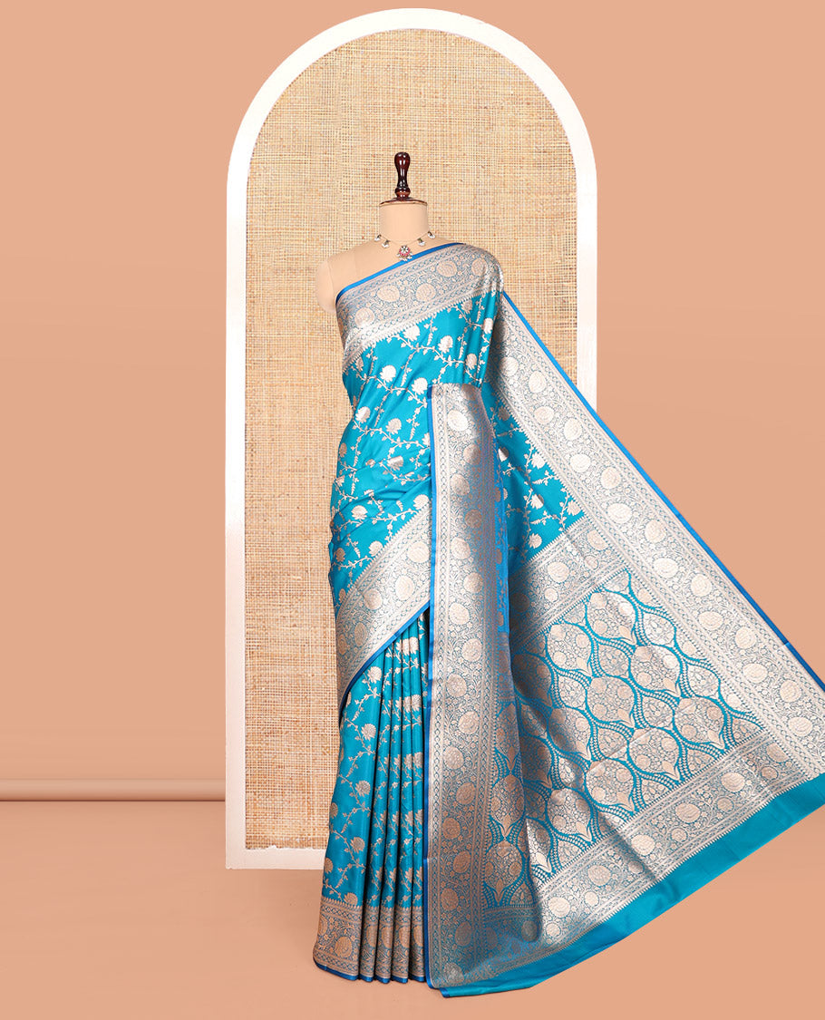 Light Blue Banarasi Nylon Saree, Detailed with Jacquard, a Floral Creeper Zari Border, Intricate Pallu, and a Matching Blouse