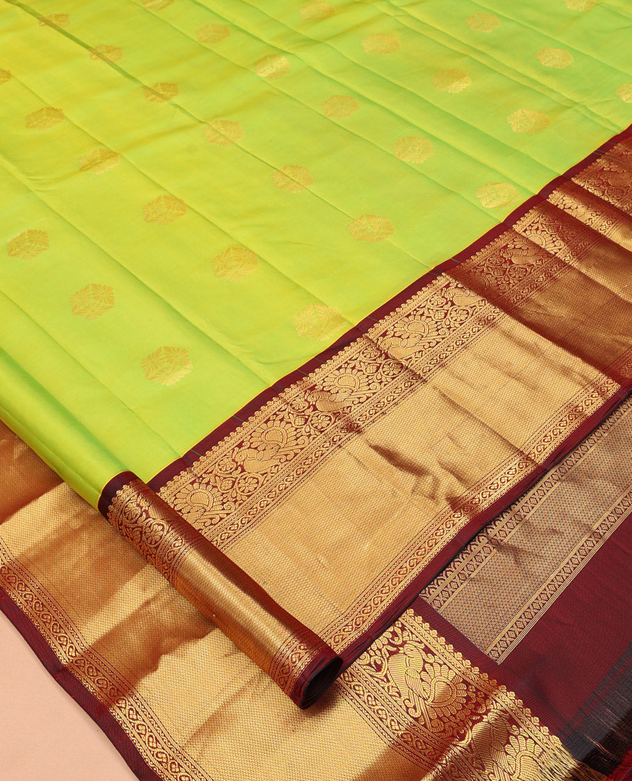 Green Vasundhara Silk Saree, Woven with Zari Buttas, a Contrast Border of Neli, Mayil, Kodi Visiry, and Vanki Designs, Grand Pallu, and a Contrast Blouse