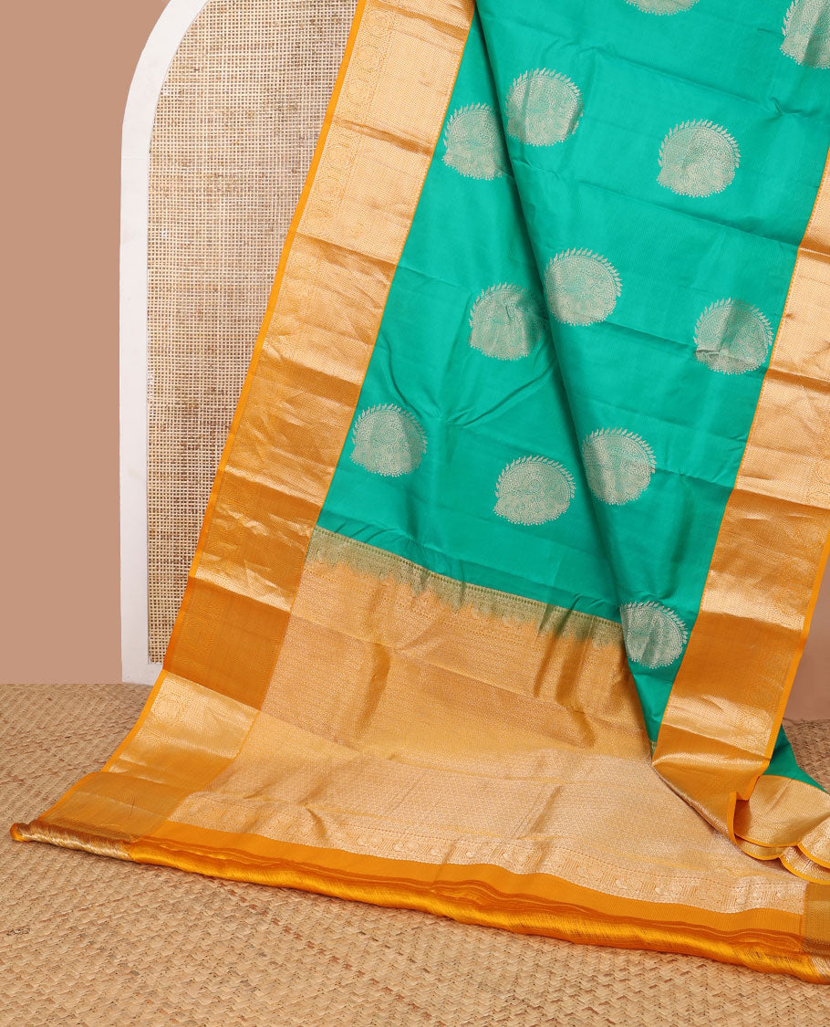 Green buttas silk saree with contrast border thilakm mokku, banaras, muthu design & floral design pallu