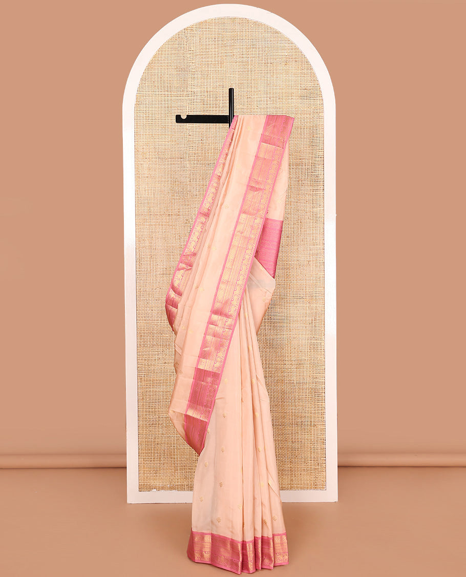 Sandal zari buttas Vasundhara silk mix saree, contrast border of chakra, muthu, mayil kann, paiyaadi kann, and Pichwai cow designs, and intricate pallu