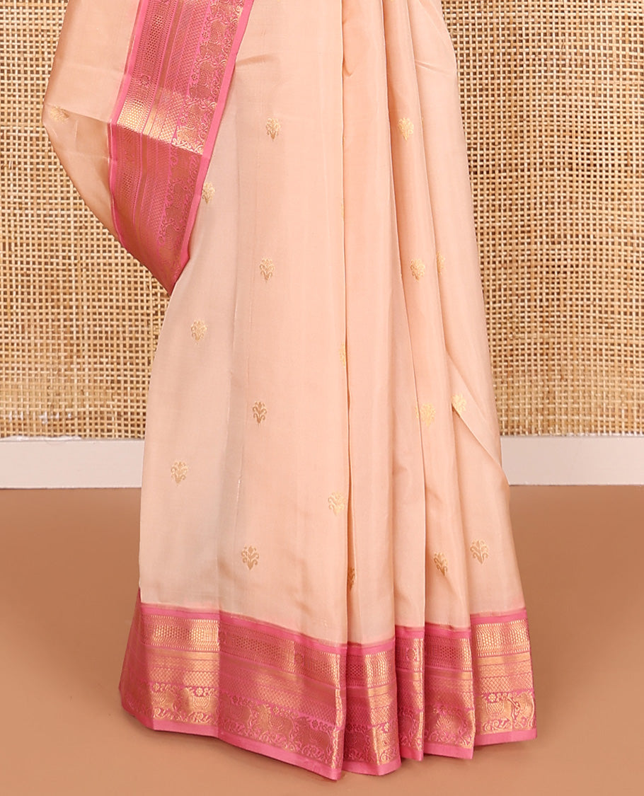 Sandal zari buttas Vasundhara silk mix saree, contrast border of chakra, muthu, mayil kann, paiyaadi kann, and Pichwai cow designs, and intricate pallu