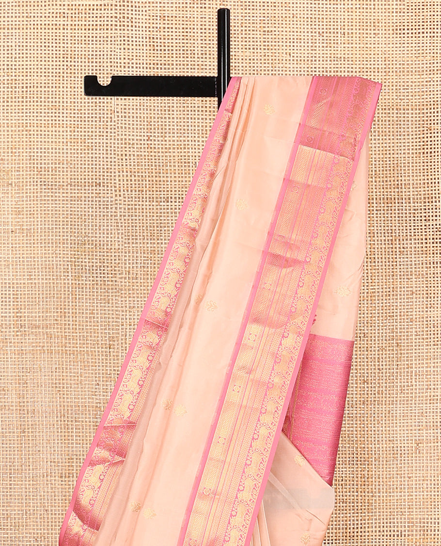 Sandal zari buttas Vasundhara silk mix saree, contrast border of chakra, muthu, mayil kann, paiyaadi kann, and Pichwai cow designs, and intricate pallu