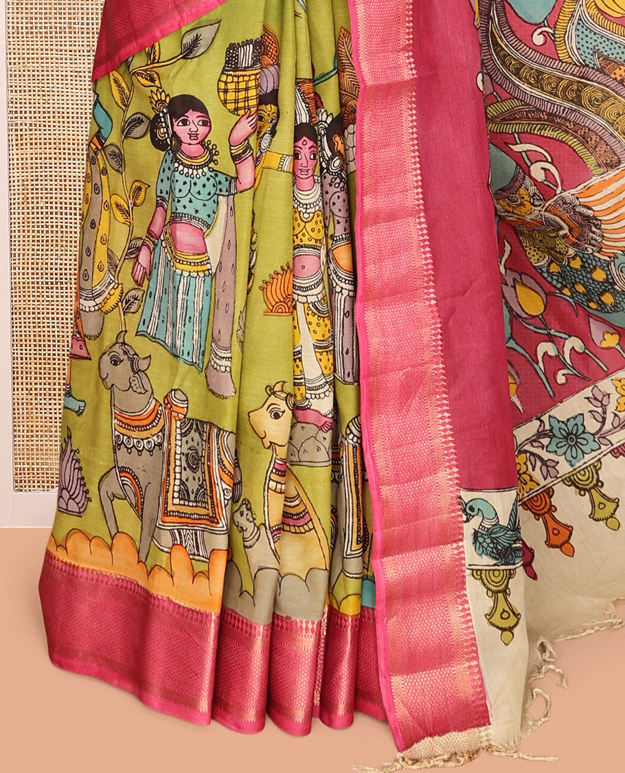 Green Kalamkari Silk Saree, Subtly Enriched with Pichwai Cow and Human Figurines, a Contrast Traditional Border, Peacock Pallu, and a Contrast Blouse